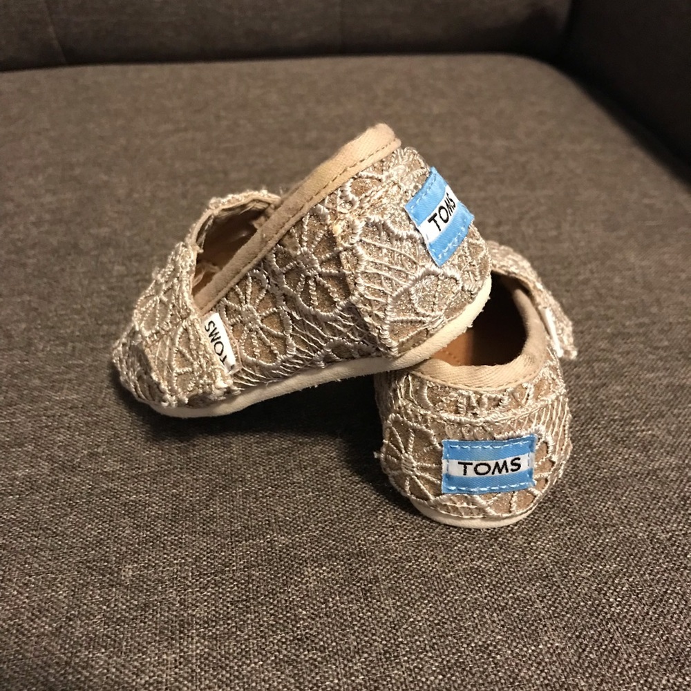 Little girls like new TOMS shoes